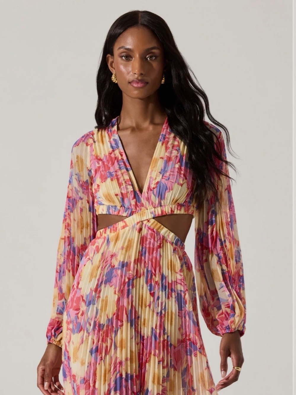 ASTR  floral long sleeve dress with side cut outs and open back